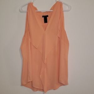 Plus size peach sleeveless blouse